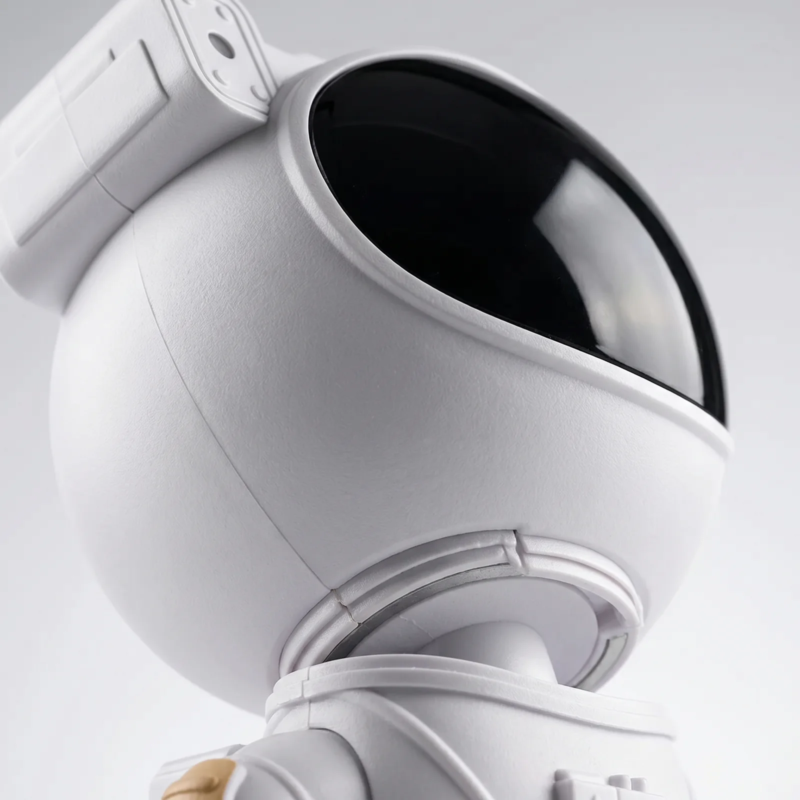 Macro studio shot of the magnetic helmet head and glossy visor lens